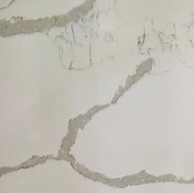 Stone countertop samples — calacatta marble and quartz at X Cabinet & Stone