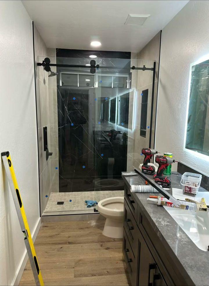 Bathroom with glass sliding shower door and double vanity, Flagstaff, AZ