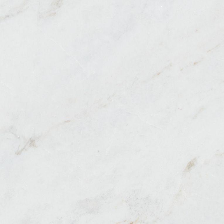 Calacatta Umber — available at X Cabinet & Stone Flagstaff